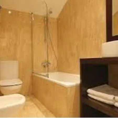 Hotel Asador Versus