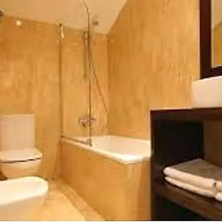 Asador Versus Otel
