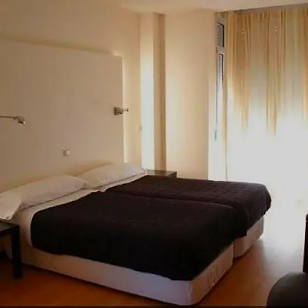 Asador Versus Otel