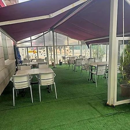 Asador Versus Otel