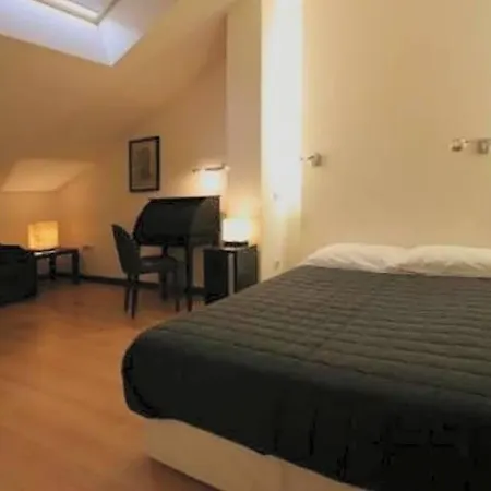 Asador Versus Hotel